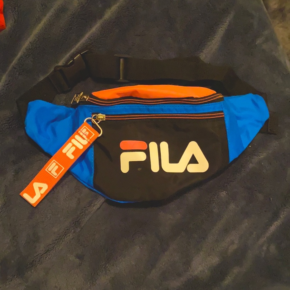 pink & blue Fila fanny pack. trying to purge my closet & lay bills.